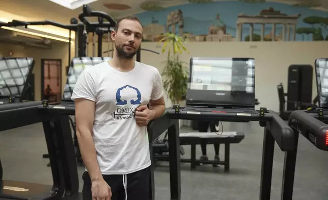 Personal trainer Valerio Masella, 26, who trained Robert Francis Prevost before the cardinal became Pope Leo XIV, poses at his gym near the Vatican, Wednesday, May 21, 2025. (AP Photo/Alessandra Tarantino)