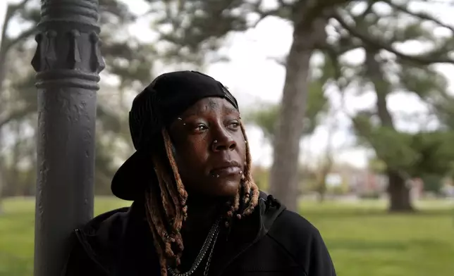 Tazz Webster, who ultimately wound up homeless after an apartment manager allegedly ridiculed and shoved him because he is transgender, poses for a photo, April 9, 2025, in St. Louis. (AP Photo/Jeff Roberson)