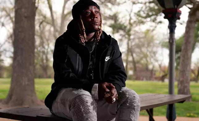 Tazz Webster, who ultimately wound up homeless after an apartment manager allegedly ridiculed and shoved him because he is transgender, poses for a photo, April 9, 2025, in St. Louis. (AP Photo/Jeff Roberson)