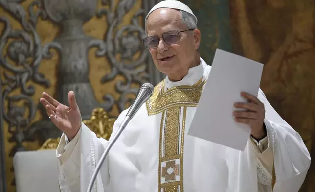 Newly elected Pope Leo XIV concelebrates Mass with the College of Cardinals inside the Sistine Chapel at the Vatican the day after his election as 267th pontiff of the Roman Catholic Church, Friday, May 9, 2025. (Vatican Media via AP)