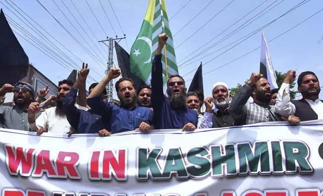 Supporters of Pasban-e-Hurriyat Jammu and Kashmir hold an anti-India demonstration, in Muzaffarabad, the capital of Pakistan administered Kashmir, Monday, May 5, 2025. (AP Photo/M.D. Mughal)