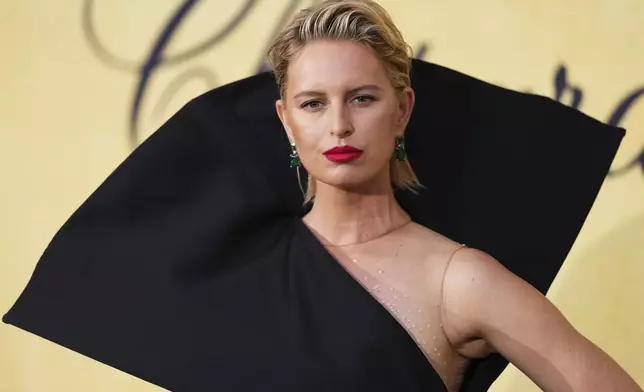 Karolina Kurkova poses for photographers upon arrival at the amfAR Cinema Against AIDS benefit at the Hotel du Cap-Eden-Roc, during the 78th Cannes international film festival, Cap d'Antibes, southern France, Thursday, May 22, 2025. (Photo by Scott A Garfitt/Invision/AP)