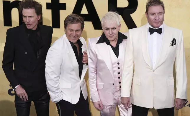 John Taylor, from left, Roger Taylor, Nick Rhodes, Simon Le Bon of Duran Duran pose for photographers upon arrival at the amfAR Cinema Against AIDS benefit at the Hotel du Cap-Eden-Roc, during the 78th Cannes international film festival, Cap d'Antibes, southern France, Thursday, May 22, 2025. (Photo by Scott A Garfitt/Invision/AP)
