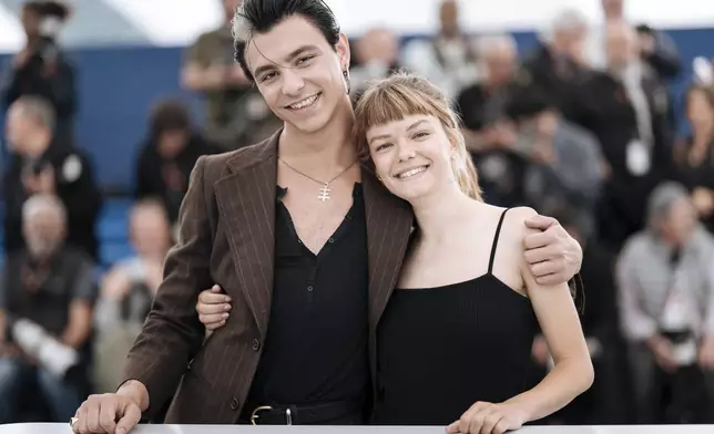 Mitch, left, and Llucia Garcia pose for photographers at the photo call for the film 'Romeria' at the 78th international film festival, Cannes, southern France, Thursday, May 22, 2025. (Photo by Lewis Joly/Invision/AP)