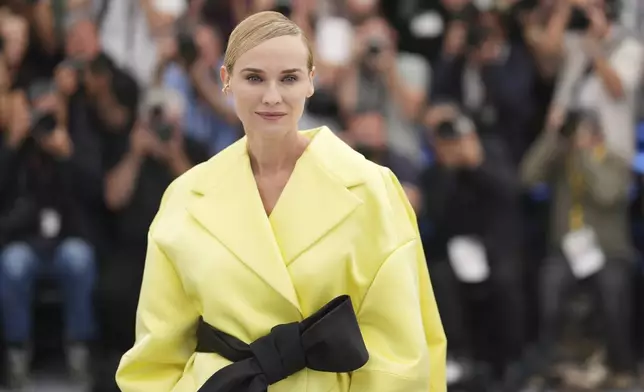 Diane Kruger poses for photographers at the photo call for the film 'Amrum' at the 78th international film festival, Cannes, southern France, Friday, May 16, 2025. (Photo by Lewis Joly/Invision/AP)