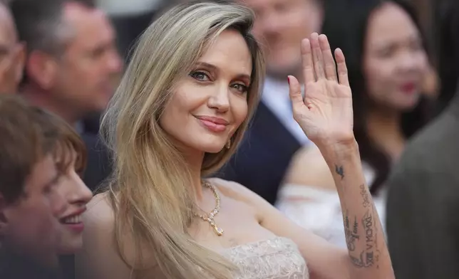 Angelina Jolie poses for photographers upon arrival at the premiere of the film 'Eddington' at the 78th international film festival, Cannes, southern France, Friday, May 16, 2025. (Photo by Lewis Joly/Invision/AP)