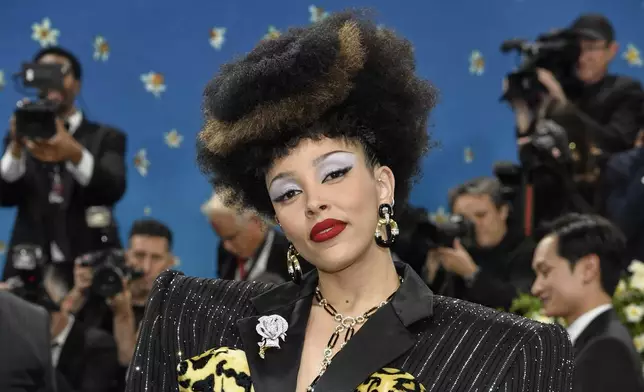 Doja Cat attends The Metropolitan Museum of Art's Costume Institute benefit gala celebrating the opening of the "Superfine: Tailoring Black Style" exhibition on Monday, May 5, 2025, in New York. (Photo by Evan Agostini/Invision/AP)