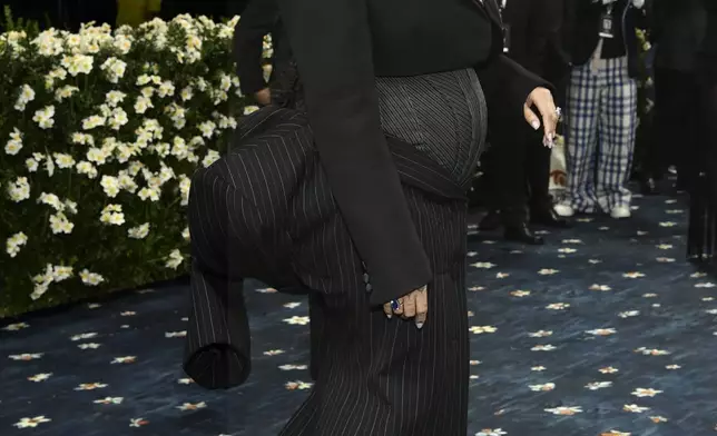 Rihanna attends The Metropolitan Museum of Art's Costume Institute benefit gala celebrating the opening of the "Superfine: Tailoring Black Style" exhibition on Monday, May 5, 2025, in New York. (Photo by Evan Agostini/Invision/AP)