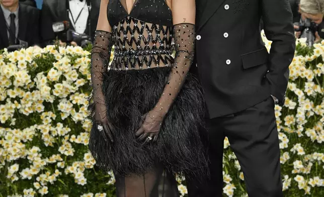 Dua Lipa, left, and Callum Turner attend The Metropolitan Museum of Art's Costume Institute benefit gala celebrating the opening of the "Superfine: Tailoring Black Style" exhibition on Monday, May 5, 2025, in New York. (Photo by Evan Agostini/Invision/AP)