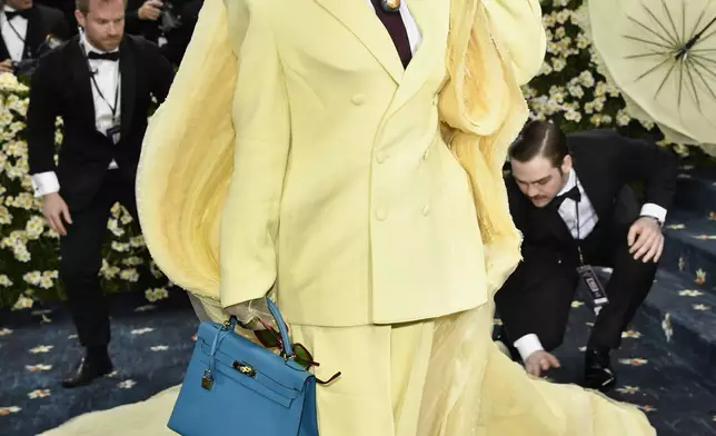 Lauryn Hill attends The Metropolitan Museum of Art's Costume Institute benefit gala celebrating the opening of the "Superfine: Tailoring Black Style" exhibition on Monday, May 5, 2025, in New York. (Photo by Evan Agostini/Invision/AP)