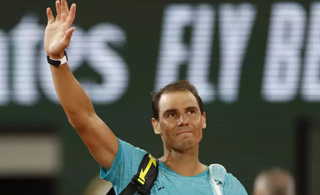 FILE - Spain's Rafael Nadal waves as he leaves the court after losing against Germany's Alexander Zverev during their first round match of the French Open tennis tournament at the Roland Garros stadium in Paris, May 27, 2024. (AP Photo/Jean-Francois Badias, File)