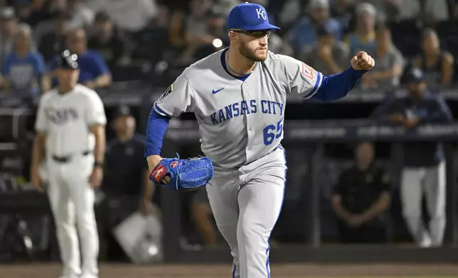 Kansas City Royals pitcher Noah Cameron (65) pumps his fist after striking out Tampa Bay Rays' Junior Caminero (not pictured) to end the sixth inning of a baseball game against the Tampa Bay Rays, Wednesday, April 30, 2025, in Tampa, Fla. (AP Photo/Jason Behnken)