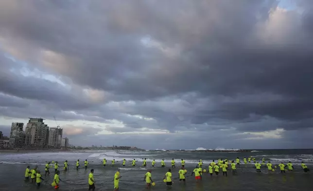 Relatives and supporters of Israelis held hostage by Hamas in Gaza release balloons to mark the 600 days of captivity, demanding their release and an end of the war in Tel Aviv, Israel, Wednesday, May 28, 2025. (AP Photo/Ariel Schalit)