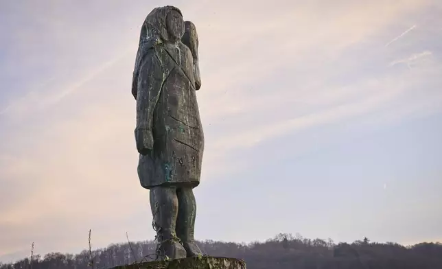 This Wednesday, Nov. 6, 2024 photo shows the bronze statue representing Melania Trump that was sawed off and taken away, in the village of Rozno, Slovenia, near Malenia Trump's hometown of Sevnica. (AP Photo/Darko Bandic)