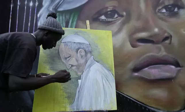 FILE - Graffiti artist Alexander Ikawah, paints Pope Francis on a canvas in Nairobi, Kenya Monday, April 21, 2025. (AP Photo/Brian Inganga, File)