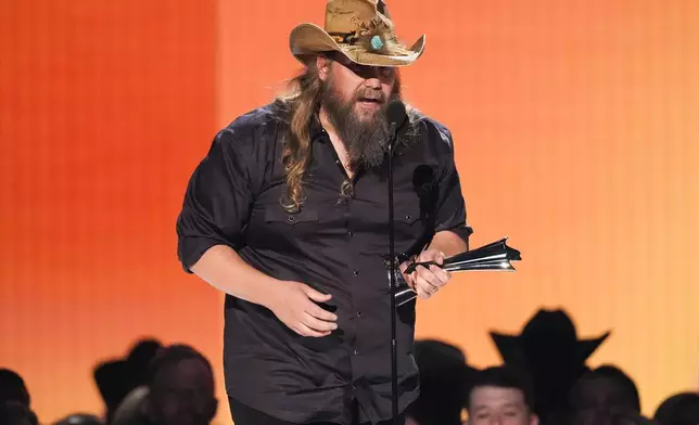 Chris Stapleton accepts the award for male artist of the year during the 60th annual Academy of Country Music Awards on Thursday, May 8, 2025, in Frisco, Texas. (AP Photo/Chris Pizzello)