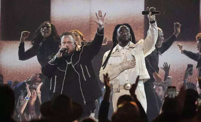 Jelly Roll, left, and Shaboozey perform "Amen" during the 60th annual Academy of Country Music Awards on Thursday, May 8, 2025, in Frisco, Texas. (AP Photo/Chris Pizzello)