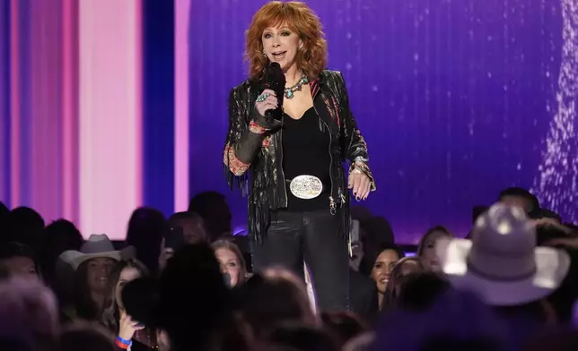 FILE - Host Reba McEntire speaks during the 59th annual Academy of Country Music Awards on Thursday, May 16, 2024, at the Ford Center in Frisco, Texas. (AP Photo/Chris Pizzello)