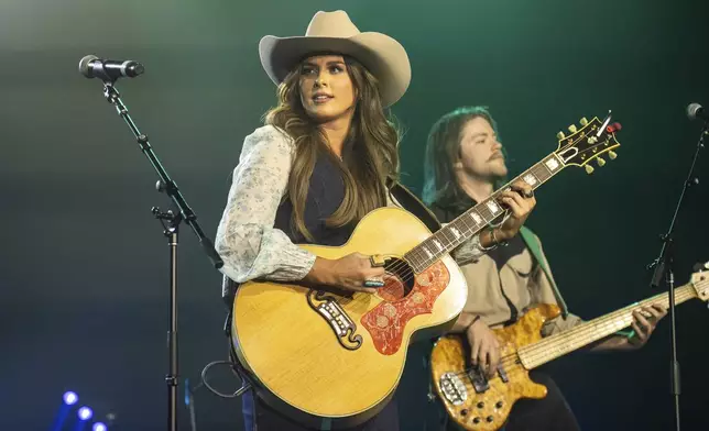 FILE - Ella Langley performs during Amazon Music Country Heat at Country Radio Seminar in Nashville, Tenn., on Feb. 28, 2024. (Photo by Amy Harris/Invision/AP, File)