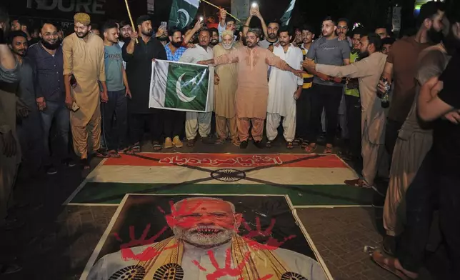 Pakistanis hold demonstration to condemn Indian missile strikes, in Hyderabad, Pakistan, Wednesday, May 7, 2025. (AP Photo/Pervez Masih)