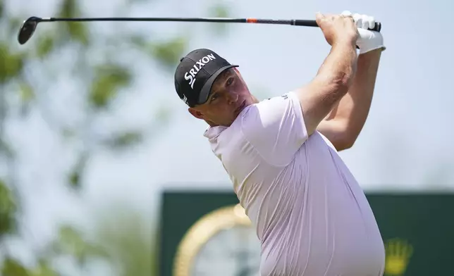 Sepp Straka, of Austria, watches his shot on the first hole during the final round of the Truist Championship golf tournament at the Philadelphia Cricket Club, Sunday, May 11, 2025, in Flourtown. (AP Photo/Matt Rourke)