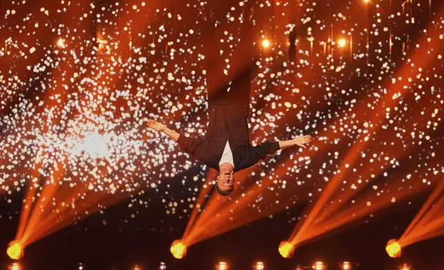 Klemen from Slovenia performs the song "How Much Time Do We Have Left" during the first semi-final of the 69th Eurovision Song Contest, in Basel, Switzerland, Tuesday, May 13, 2025. (AP Photo/Martin Meissner)