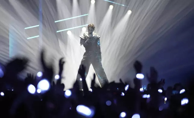Kyle Alessandro from Norway performs the song 'Lighter' during the dress rehearsal for the first semi-final of the 69th Eurovision Song Contest, in Basel, Switzerland, Monday, May 12, 2025. (AP Photo/Martin Meissner)