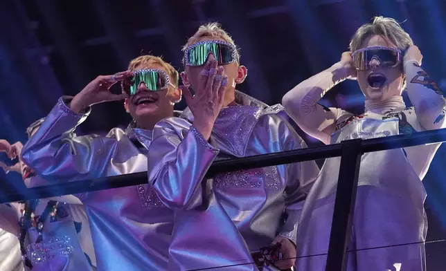 VAEB from Iceland who performed the song "ROA" celebrate after progressing through during the first semi-final to the final of the 69th Eurovision Song Contest, in Basel, Switzerland, Tuesday, May 13, 2025. (AP Photo/Martin Meissner)