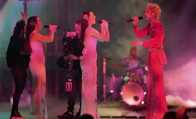 Ziferblat from Ukraine performs the song "Bird of Pray" during the dress rehearsal for the first semi-final of the 69th Eurovision Song Contest, in Basel, Switzerland, Monday, May 12, 2025. (AP Photo/Martin Meissner)