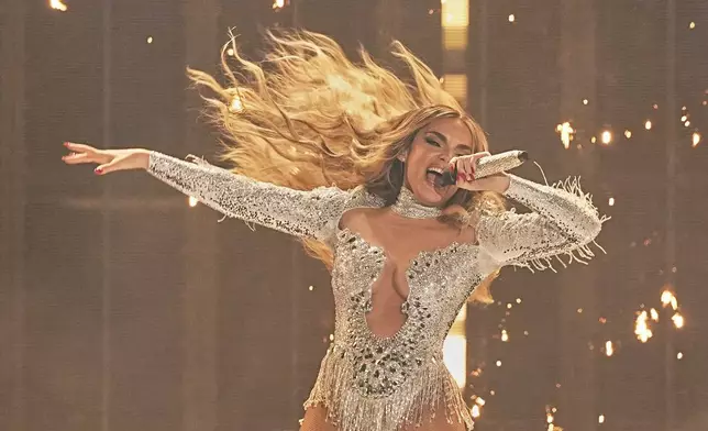 Melody from Spain performs the song "ESA DIVA" during the first semi-final of the 69th Eurovision Song Contest, in Basel, Switzerland, Tuesday, May 13, 2025. (AP Photo/Martin Meissner)