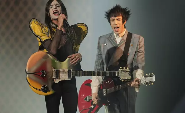 Lucio Corsi from Italy performs the song "Volevo Essere Un Duro" during the first semi-final of the 69th Eurovision Song Contest, in Basel, Switzerland, Tuesday, May 13, 2025. (AP Photo/Martin Meissner)