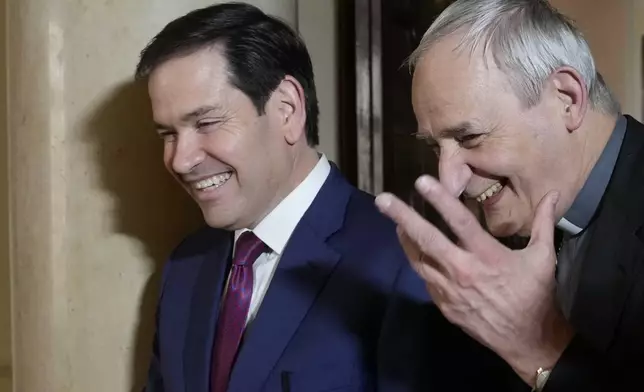 Secretary of State Marco Rubio, left, and President of the Conference of Italian Bishops, Cardinal Matteo Zuppi, meet at the U.S. Embassy to the Holy See in Rome, Saturday, May 17, 2025. (AP Photo/Gregorio Borgia)