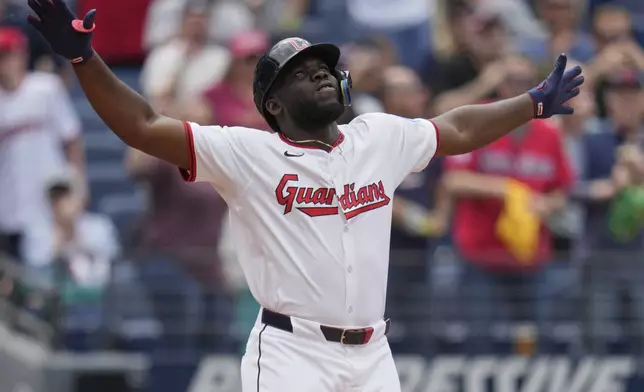 Cleveland Guardians' Jhonkensy Noel gestures as he scores on his home run in the fourth inning of a baseball game against the Minnesota Twins in Cleveland, Thursday, May 1, 2025. (AP Photo/Sue Ogrocki)