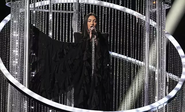 Yuval Raphael from Israel performs the song "New Day Will Rise" during the second semi-final of the 69th Eurovision Song Contest, in Basel, Switzerland, Thursday, May 15, 2025. (AP Photo/Martin Meissner)