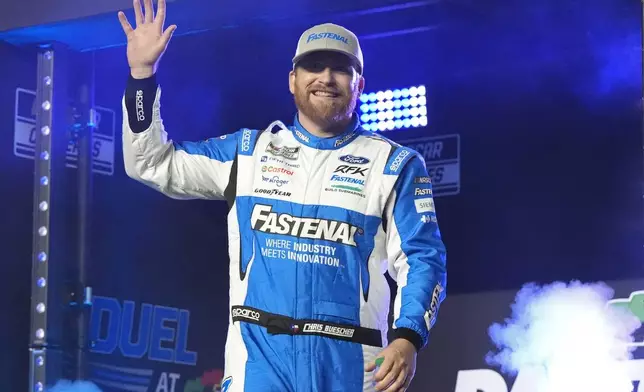 FILE - Chris Buescher during driver introductions before two NASCAR Daytona 500 qualifying auto races at Daytona International Speedway, Thursday, Feb. 13, 2025, in Daytona Beach, Fla. (AP Photo/John Raoux, File)