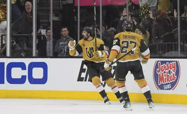 Vegas Golden Knights right wing Mark Stone (61) celebrates after scoring a second goal against the Edmonton Oilers during the first period of Game 1 of a second-round NHL hockey playoff series Tuesday, May 6, 2025, in Las Vegas. (AP Photo/John Locher)