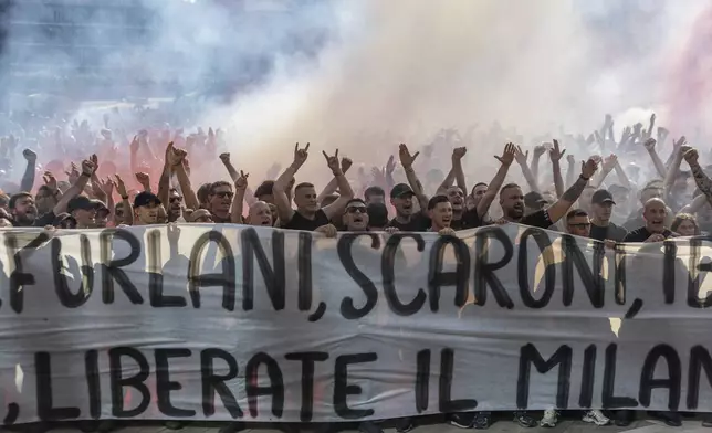AC Milan fans hold a protest in the square of the Portello area of Milan, Italy near the club's headquarters on Saturday, May 24, 2025. (Stefano Porta/LaPresse via AP)