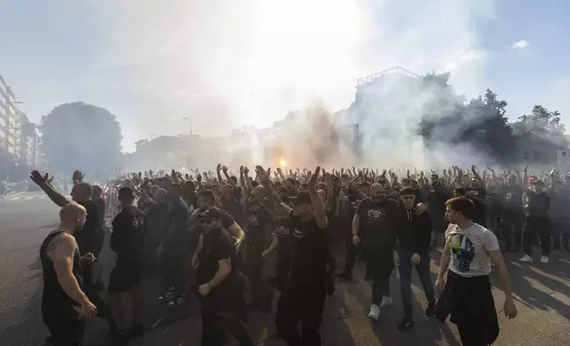 AC Milan fans hold a protest in the square of the Portello area of Milan, Italy near the club's headquarters on Saturday, May 24, 2025. (Stefano Porta/LaPresse via AP)