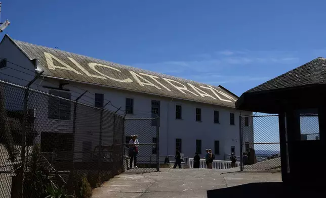 Visitors tour Alcatraz Island in San Francisco, Monday, May 5, 2025. (AP Photo/Jed Jacobsohn)