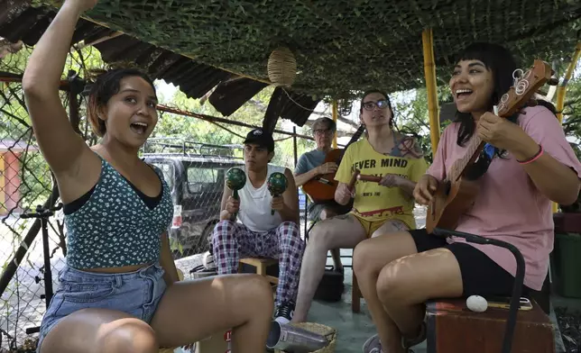 Mulato Teatro cast members from left to right, Caro Rodríguez, Aldo Martin; Jesús Peredo; Annya Atanasio Cadena and Eréndira Castorela, rehearse for their upcoming performance in the First International Afro-Scenic Festival, in Ticumán, Mexico, Saturday, May 17, 2025. (AP Photo/Ginnette Riquelme)