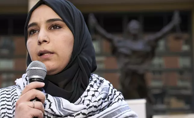 Mapheze Saleh, wife of arrested and detained Georgetown University scholar Badar Khan Suri, speaks at a news conference following her husband's hearing at Federal District Court for the Eastern District of Virginia, in Alexandria, Va., Thursday, May 1, 2025. (AP Photo/Jacquelyn Martin)