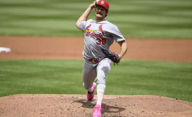 St. Louis Cardinals starting pitcher Miles Mikolas throws during the second inning of a baseball game against the Washington Nationals, Sunday, May 11, 2025, in Washington. (AP Photo/Nick Wass)