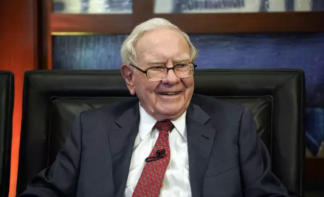 FILE - Berkshire Hathaway Chairman and CEO Warren Buffett smiles during an interview in Omaha, Neb., May 7, 2018, with Liz Claman on Fox Business Network's "Countdown to the Closing Bell". (AP Photo/Nati Harnik, File)