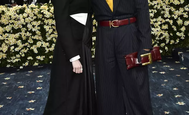 Aimee Lou Wood, left, Patrick Schwarzenegger attend The Metropolitan Museum of Art's Costume Institute benefit gala celebrating the opening of the "Superfine: Tailoring Black Style" exhibition on Monday, May 5, 2025, in New York. (Photo by Evan Agostini/Invision/AP)