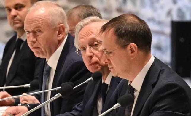Russian presidential aide, Vladimir Medinsky, right, and other members of Russian delegation attend talks with Ukrainian delegation at the Dolmabache palace, in Istanbul, Turkey, Ton Friday, May 16, 2025. (Ramil Sitdikov, Sputnik Pool Photo via AP)
