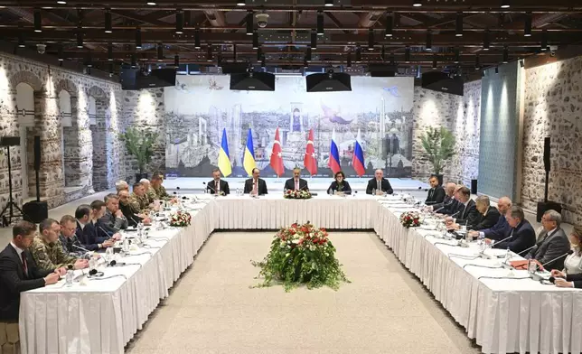 Russian and Ukrainian delegations attend talks at the Dolmabache palace, in Istanbul, Turkey, Friday, May 16, 2025. (Ramil Sitdikov, Sputnik Pool Photo via AP)