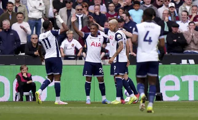 Tottenham Hotspur's Wilson Odobert celebrates scoring his side's first goal of the game, during the English Premier League soccer match between West Ham United and Tottenham Hotspur, at the London Stadium, in London, Sunday May 4, 2025. (Bradley Collyer/PA via AP)