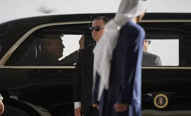 President Donald Trump leaves the airport after he was greeted by UAE President Sheikh Mohammed bin Zayed Al Nahyan at Abu Dhabi International Airport, Thursday, May 15, 2025. (AP Photo/Altaf Qadri)