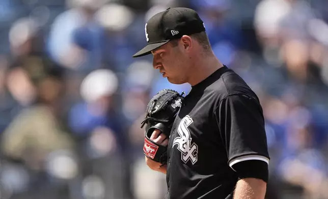 Chicago White Sox relief pitcher Jared Shuster stands on the mound before coming out to the game during the eighth inning of a baseball game against the Kansas City Royals, Thursday, May 8, 2025, in Kansas City, Mo. (AP Photo/Charlie Riedel)