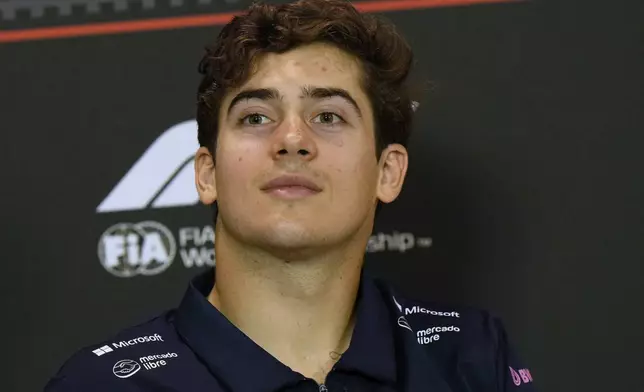 Alpine driver Franco Colapinto of Argentina answers reporters during a news conference at the Enzo and Dino Ferrari racetrack, ahead the Italy's Emilia Romagna Formula One Grand Prix in Imola, Italy, Thursday, May 15, 2025. (AP Photo/Luca Bruno)